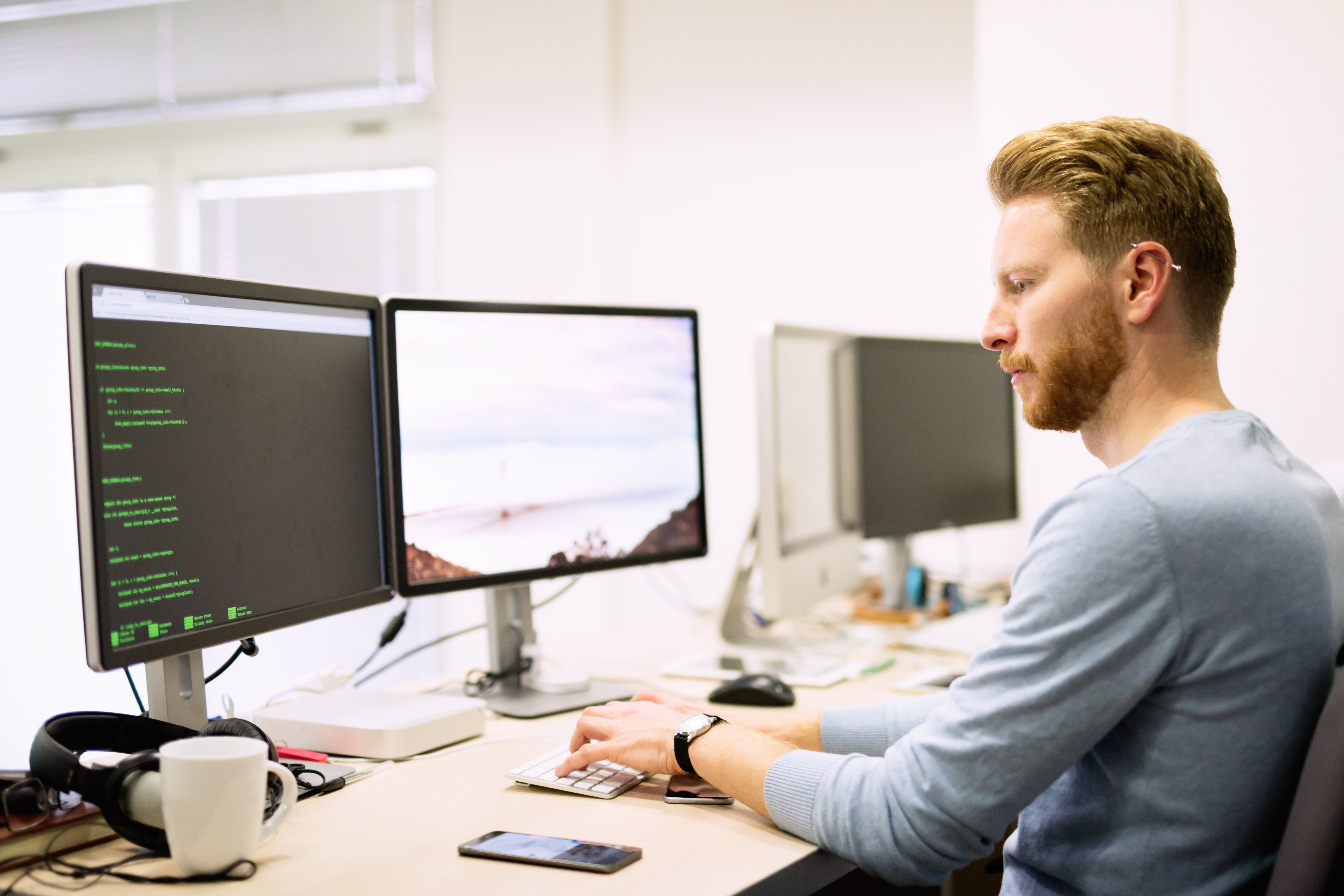 Programmer working in a software developing company office